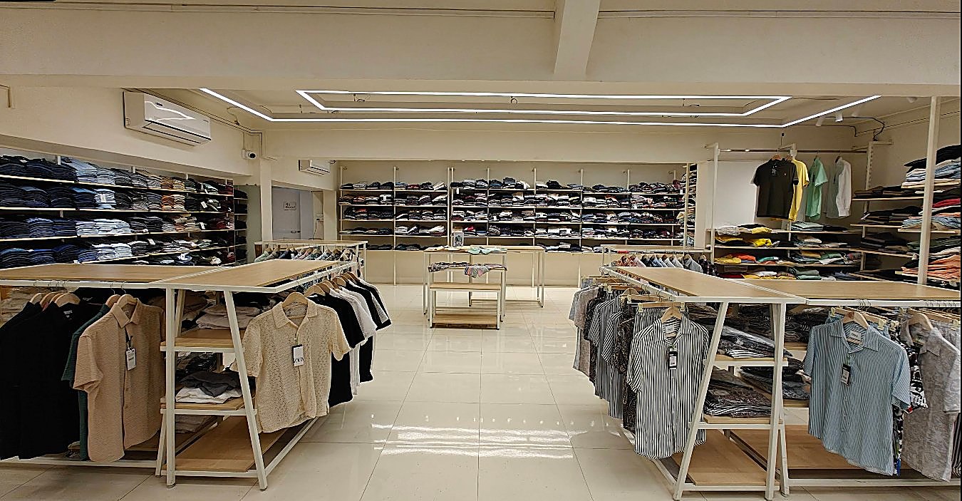 Inside Brandz Store — racks and shelves of folded and hanging menswear